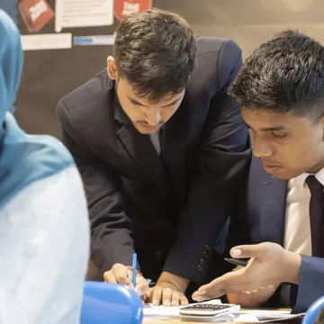 Sixth form students studying